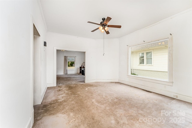 135 Corban Ave SE, Concord, NC 28025 - unfurnished room with ceiling fan, crown molding, and carpet flooring
