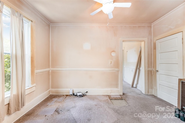 135 Corban Ave SE, Concord, NC 28025 - carpeted empty room with ceiling fan and crown molding