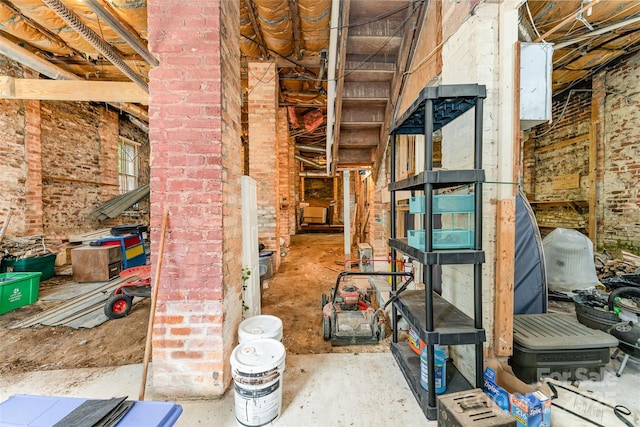 135 Corban Ave SE, Concord, NC 28025 - unfinished basement with brick wall
