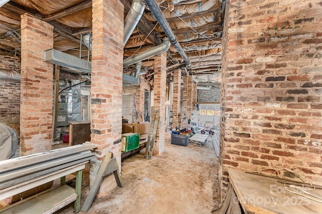 135 Corban Ave SE, Concord, NC 28025 - below grade area featuring brick wall