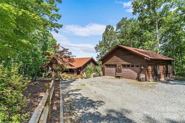 279 Outback Trl, Nebo, NC 28761 - view of front of house featuring a garage and an outdoor structure
