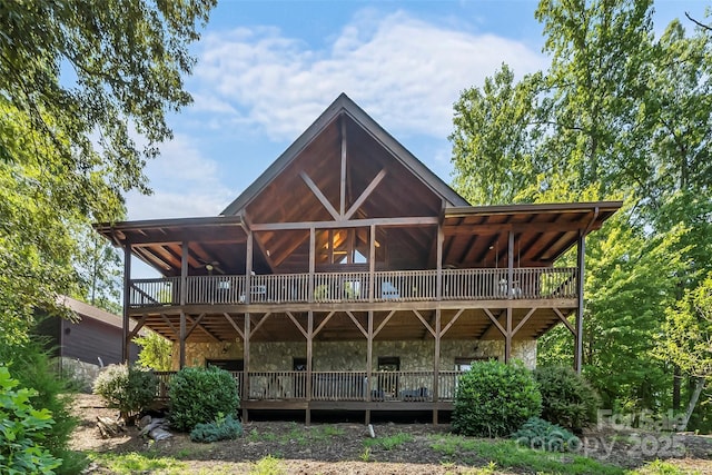 279 Outback Trl, Nebo, NC 28761 - rear view of property featuring stone siding, a wooden deck, and ceiling fan
