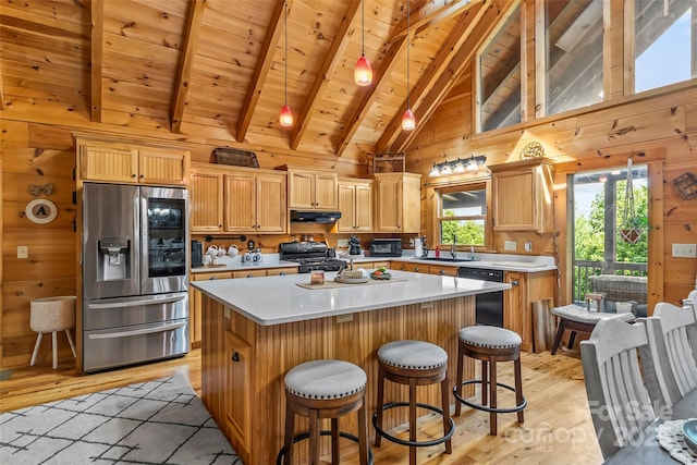 279 Outback Trl, Nebo, NC 28761 - kitchen with stainless steel fridge with ice dispenser, light wood-type flooring, dishwasher, under cabinet range hood, and a wood ceiling with exposed beams