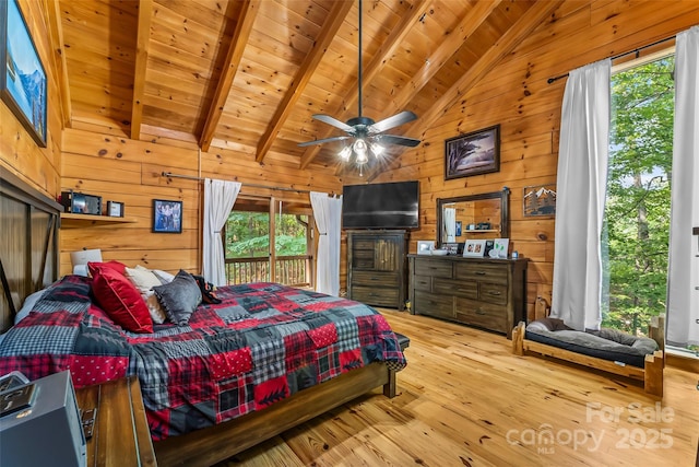 279 Outback Trl, Nebo, NC 28761 - bedroom with wood walls, wood finished floors, wood ceiling, and access to outside
