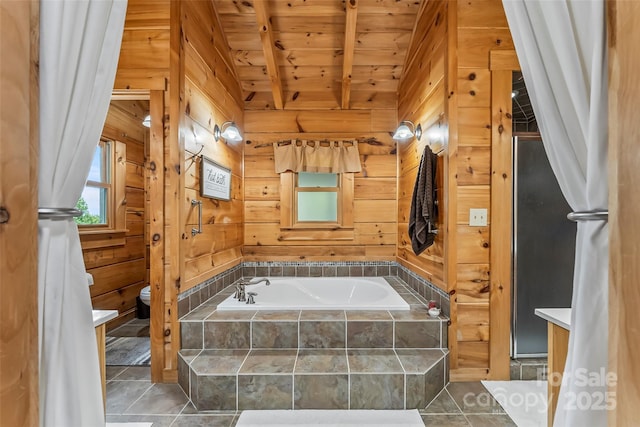 279 Outback Trl, Nebo, NC 28761 - bathroom with a wooden ceiling with exposed beams, a garden tub, wood walls, and tile patterned flooring