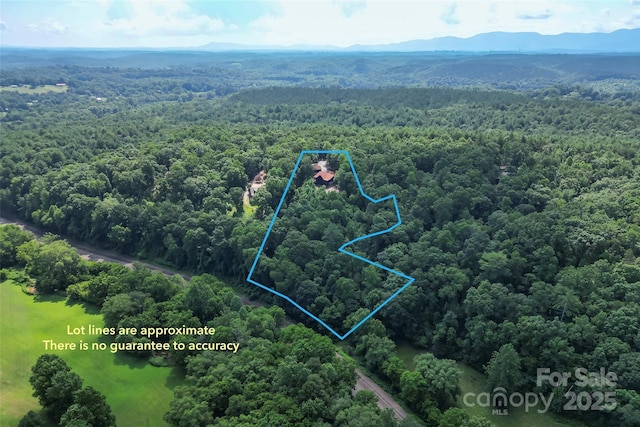 279 Outback Trl, Nebo, NC 28761 - aerial view of property's location featuring a mountainous background and property parcel outlined