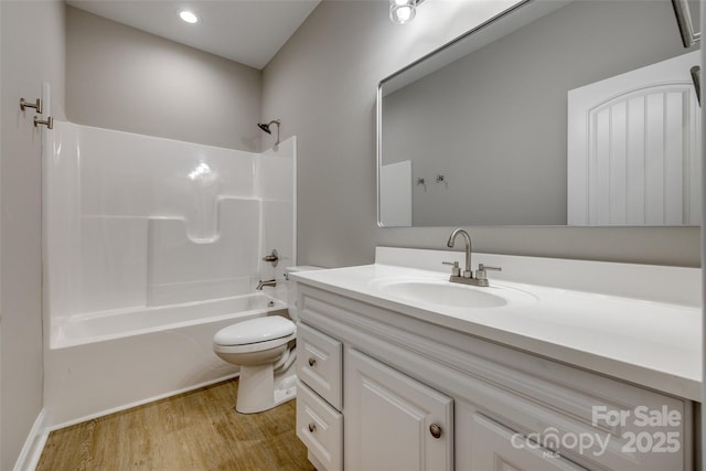 521 Tram Rd, Lancaster, SC 29720 - full bathroom featuring wood finished floors, vanity, bathtub / shower combination, and recessed lighting