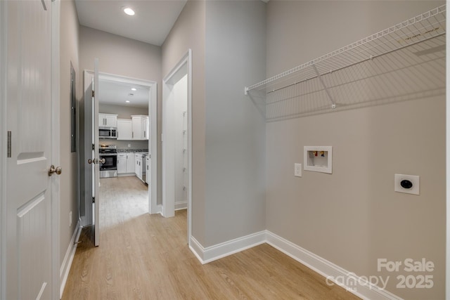 521 Tram Rd, Lancaster, SC 29720 - laundry area with washer hookup, hookup for an electric dryer, light wood-style floors, and recessed lighting