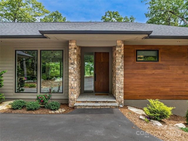 23 Haverhill Ct, Flat Rock, NC 28731 - property entrance with roof with shingles