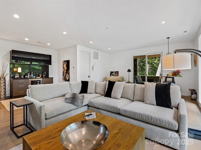 23 Haverhill Ct, Flat Rock, NC 28731 - living room with wood finished floors, recessed lighting, and a dry bar