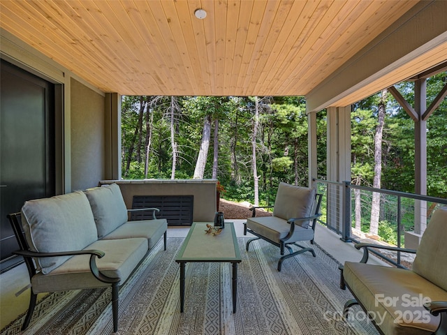 23 Haverhill Ct, Flat Rock, NC 28731 - wooden deck with outdoor lounge area and view of wooded area