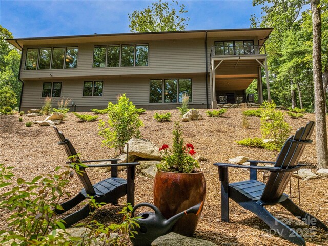 23 Haverhill Ct, Flat Rock, NC 28731 - rear view of property featuring a balcony