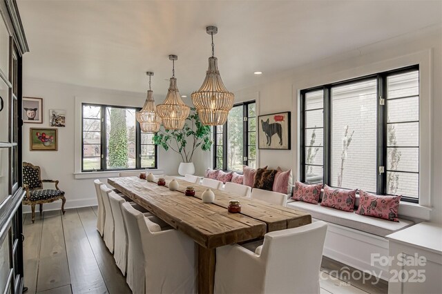 3306 Gaston Rd, Greensboro, NC 27407 - dining area featuring a chandelier, wood finished floors, and recessed lighting