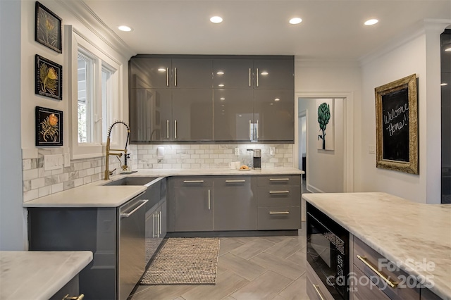 3306 Gaston Rd, Greensboro, NC 27407 - kitchen with gray cabinetry, black microwave, crown molding, stainless steel dishwasher, and modern cabinets