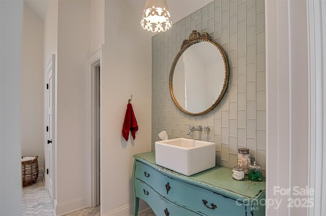 3306 Gaston Rd, Greensboro, NC 27407 - bathroom with vanity and tile walls