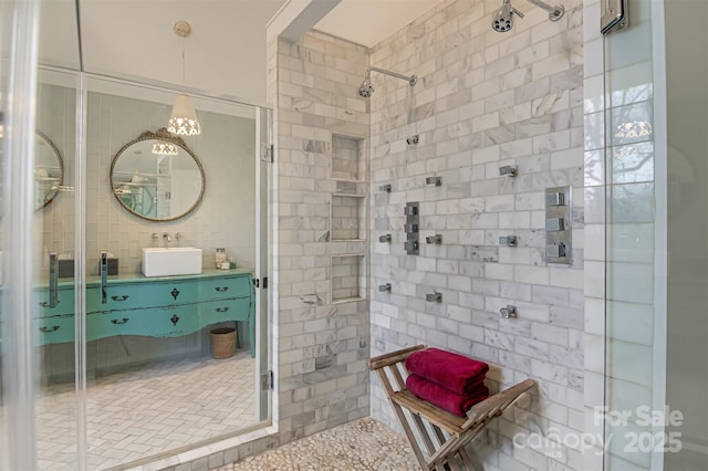 3306 Gaston Rd, Greensboro, NC 27407 - bathroom with a shower stall, vanity, and tile walls