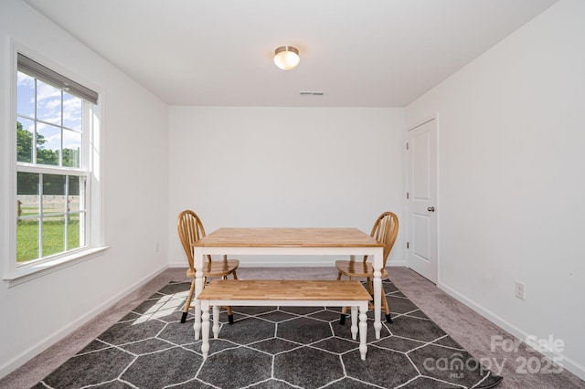 1026 Baileys Chapel Rd, Advance, NC 27006 - carpeted dining room with baseboards