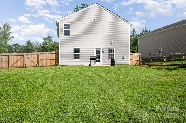 1026 Baileys Chapel Rd, Advance, NC 27006 - back of property featuring a fenced backyard