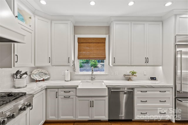 6716 Southby Ct, Charlotte, NC 28270 - kitchen with custom range hood, stainless steel appliances, white cabinets, backsplash, and recessed lighting