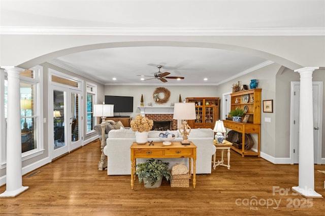 6716 Southby Ct, Charlotte, NC 28270 - living room featuring a ceiling fan, recessed lighting, arched walkways, french doors, and wood finished floors