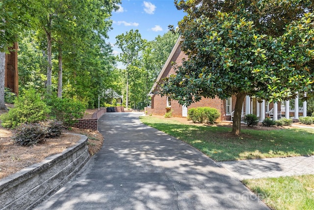 6716 Southby Ct, Charlotte, NC 28270 - view of side of property with brick siding and a lawn