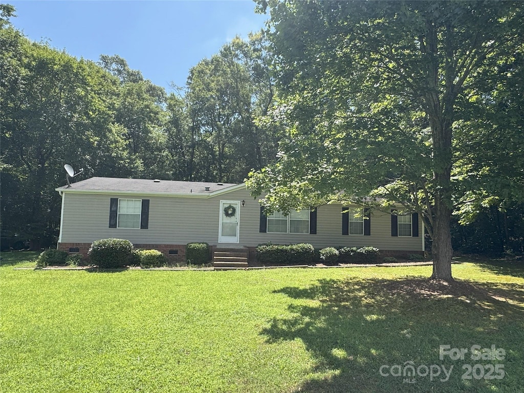 3911 Doster Rd, Monroe, NC 28112 - manufactured / mobile home featuring crawl space and a front yard