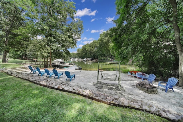 166 Atlantic Way, Mooresville, NC 28117 - view of patio with a water view and an outdoor fire pit