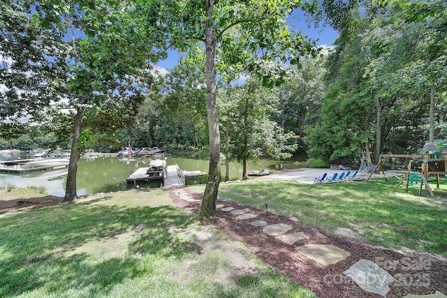 166 Atlantic Way, Mooresville, NC 28117 - view of green lawn with a dock, a playground, a water view, and view of scattered trees