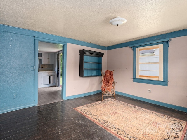 51 Riverbend St, Waynesville, NC 28786 - spare room with wood finished floors, a textured ceiling, and healthy amount of natural light