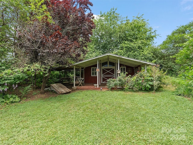 51 Riverbend St, Waynesville, NC 28786 - rear view of house with a lawn and a deck