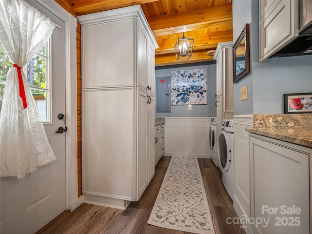 334 Arbra Mountain Way, Bostic, NC 28018 - laundry room featuring cabinet space, separate washer and dryer, wooden ceiling, dark wood-type flooring, and wainscoting