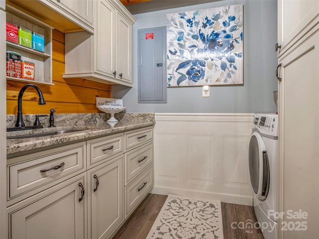 334 Arbra Mountain Way, Bostic, NC 28018 - laundry area featuring washer / clothes dryer, electric panel, cabinet space, and dark wood finished floors