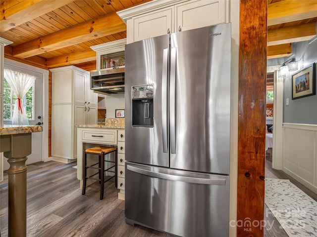 334 Arbra Mountain Way, Bostic, NC 28018 - kitchen featuring stainless steel fridge, dark wood finished floors, a wood ceiling with exposed beams, light stone countertops, and a wainscoted wall