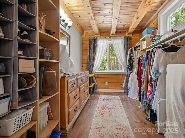 334 Arbra Mountain Way, Bostic, NC 28018 - spacious closet featuring wood finished floors and beamed ceiling