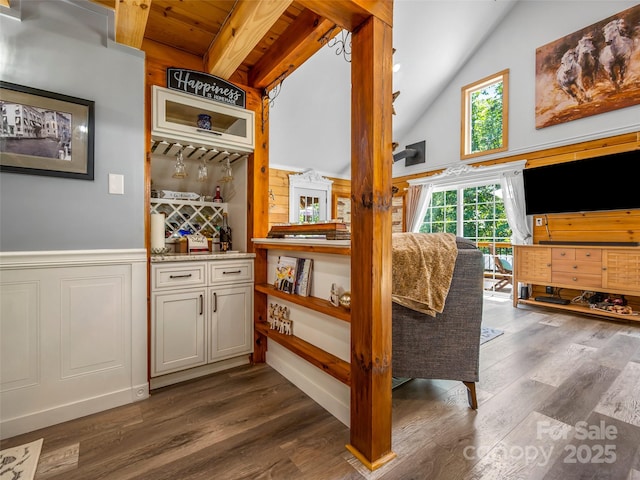 334 Arbra Mountain Way, Bostic, NC 28018 - indoor bar with wainscoting, dark wood-type flooring, high vaulted ceiling, beam ceiling, and a decorative wall