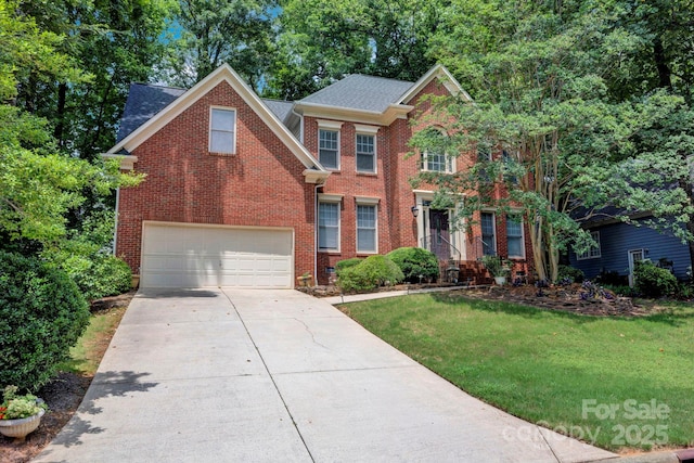 5138 Foxbriar Trl, Charlotte, NC 28269 - view of front facade featuring concrete driveway, a front yard, brick siding, an attached garage, and roof with shingles