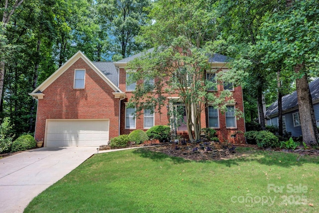 5138 Foxbriar Trl, Charlotte, NC 28269 - view of front facade with an attached garage, a front yard, concrete driveway, and brick siding