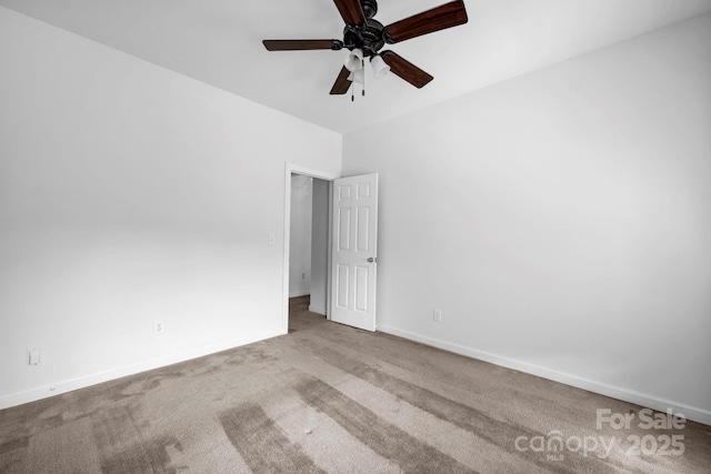5138 Foxbriar Trl, Charlotte, NC 28269 - carpeted spare room featuring a ceiling fan and baseboards