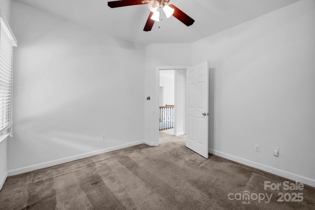 5138 Foxbriar Trl, Charlotte, NC 28269 - unfurnished bedroom featuring carpet and ceiling fan