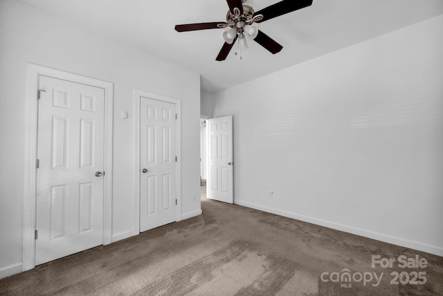 5138 Foxbriar Trl, Charlotte, NC 28269 - unfurnished bedroom with carpet flooring and a ceiling fan