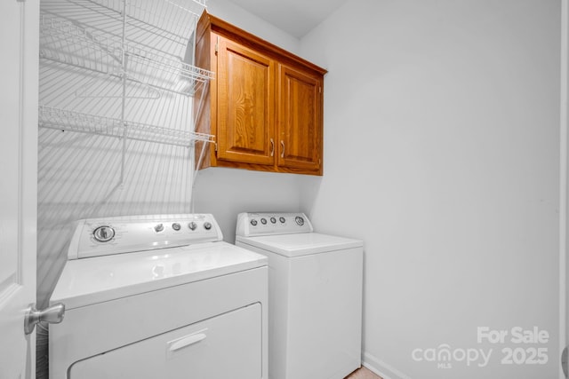 5138 Foxbriar Trl, Charlotte, NC 28269 - washroom featuring cabinet space and washing machine and clothes dryer