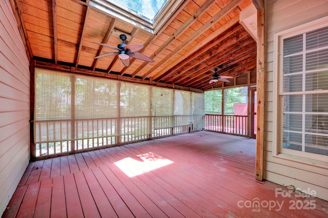 5138 Foxbriar Trl, Charlotte, NC 28269 - unfurnished sunroom with ceiling fan, a skylight, and lofted ceiling