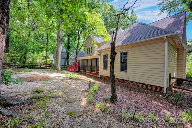 5138 Foxbriar Trl, Charlotte, NC 28269 - rear view of house featuring a sunroom, crawl space, and roof with shingles