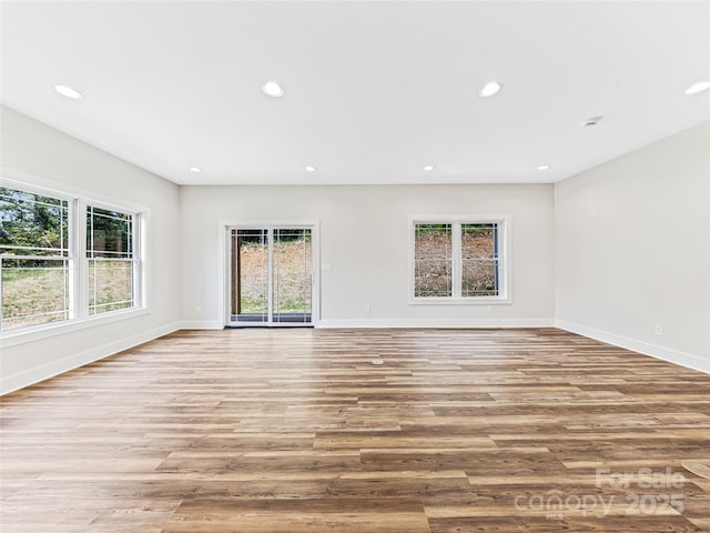 297 Bethany Dr, Mars Hill, NC 28754 - unfurnished room with light wood finished floors and recessed lighting