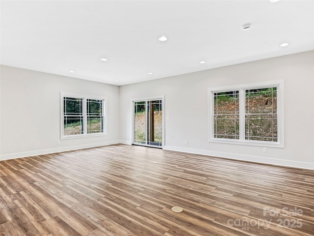 297 Bethany Dr, Mars Hill, NC 28754 - unfurnished living room featuring wood finished floors and recessed lighting