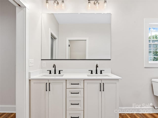 297 Bethany Dr, Mars Hill, NC 28754 - full bathroom featuring double vanity and wood finished floors