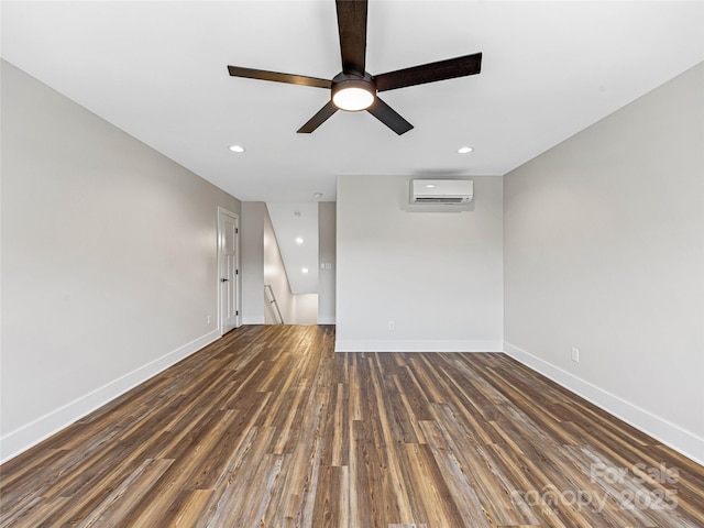 297 Bethany Dr, Mars Hill, NC 28754 - unfurnished living room featuring a wall mounted AC, a ceiling fan, wood finished floors, and recessed lighting