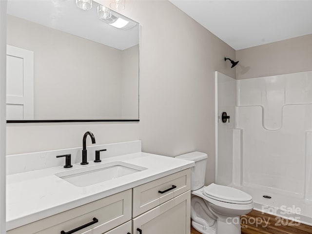 297 Bethany Dr, Mars Hill, NC 28754 - bathroom featuring a shower, wood finished floors, and vanity