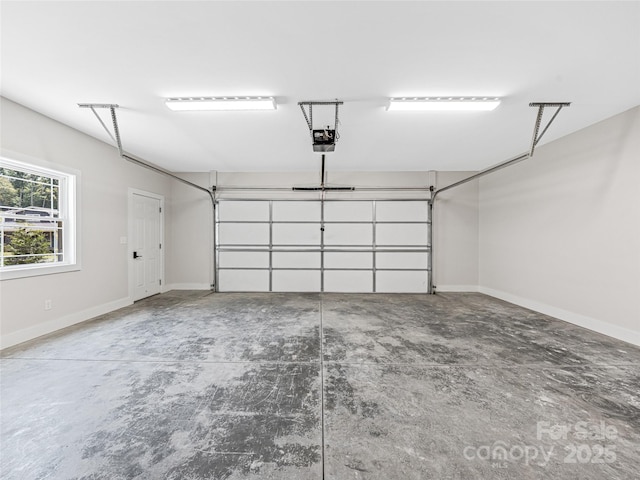 297 Bethany Dr, Mars Hill, NC 28754 - garage with a garage door opener and baseboards