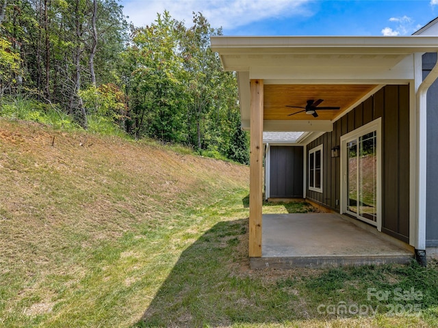 297 Bethany Dr, Mars Hill, NC 28754 - view of grassy yard with ceiling fan and a patio area